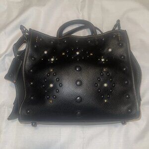 Coach Rogue 31 EUC Coach Western Rogue 31